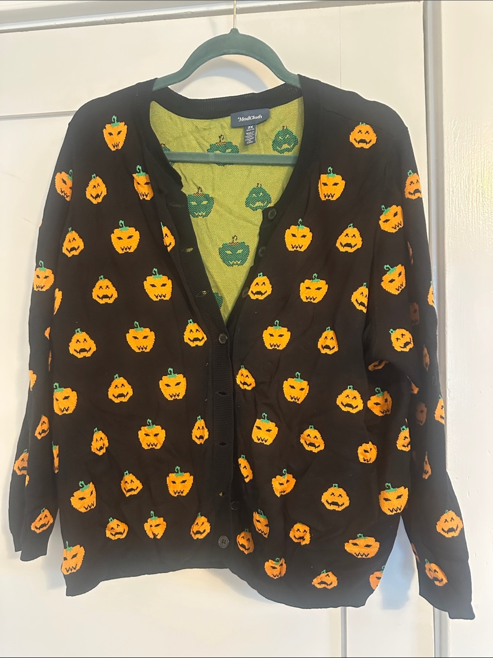 ModCloth Black Cardigan with Orange Jack-o'-Lantern Pattern